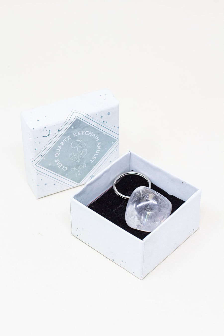 Clear quartz amulet in its box.